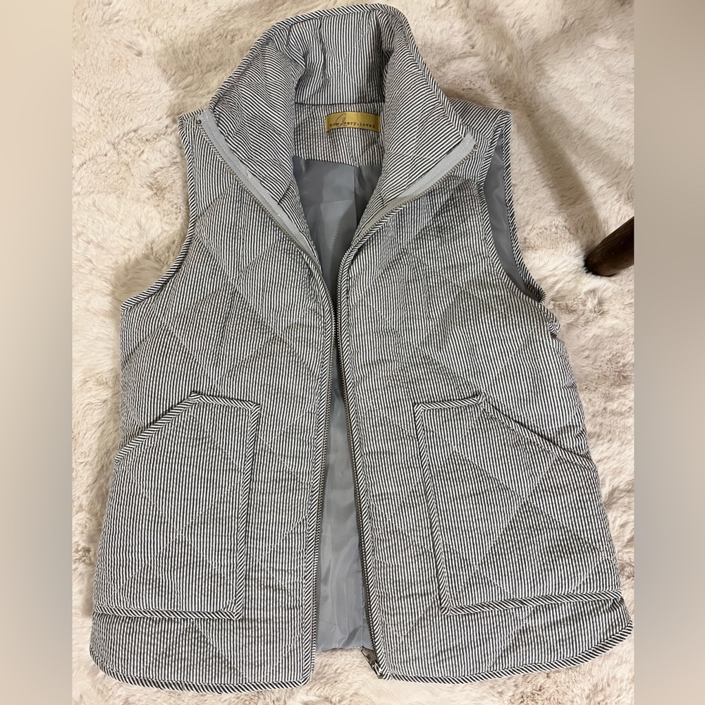 Blue and white vest. Size small/medium